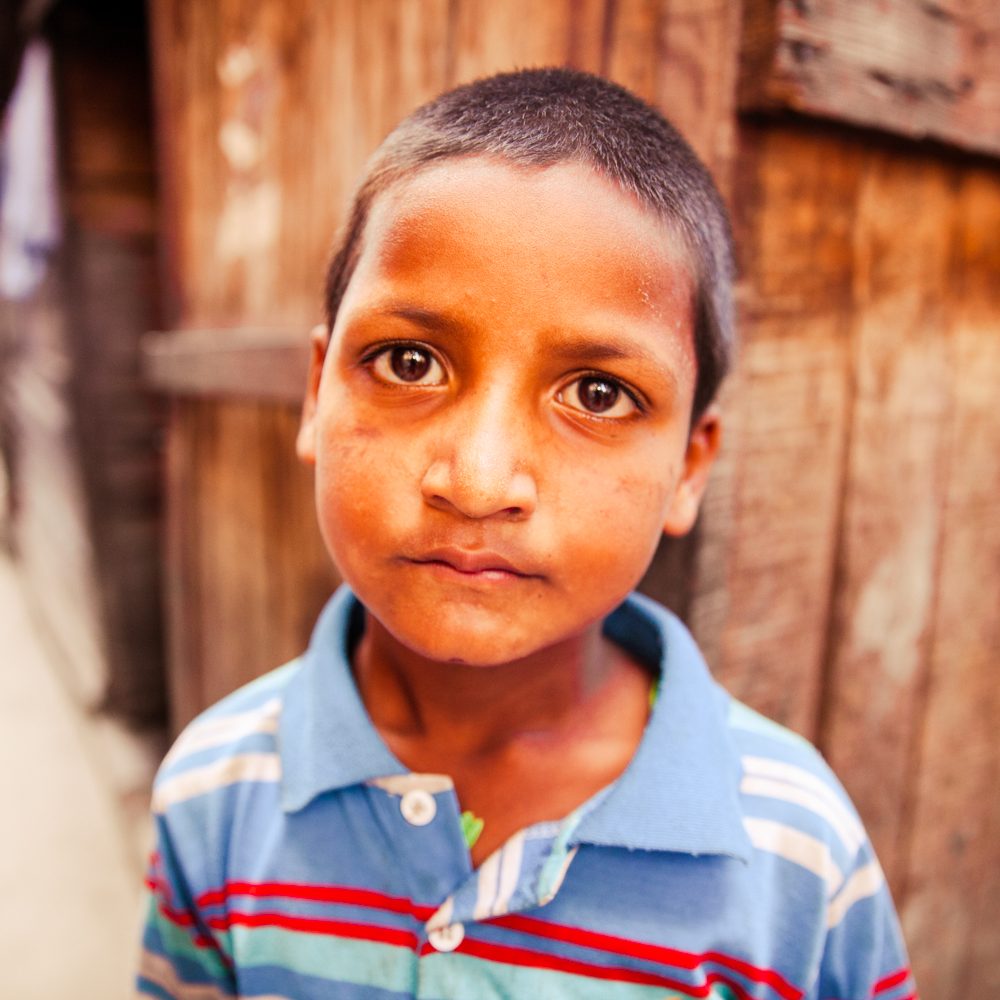 little boy from Nepal looking at the camera